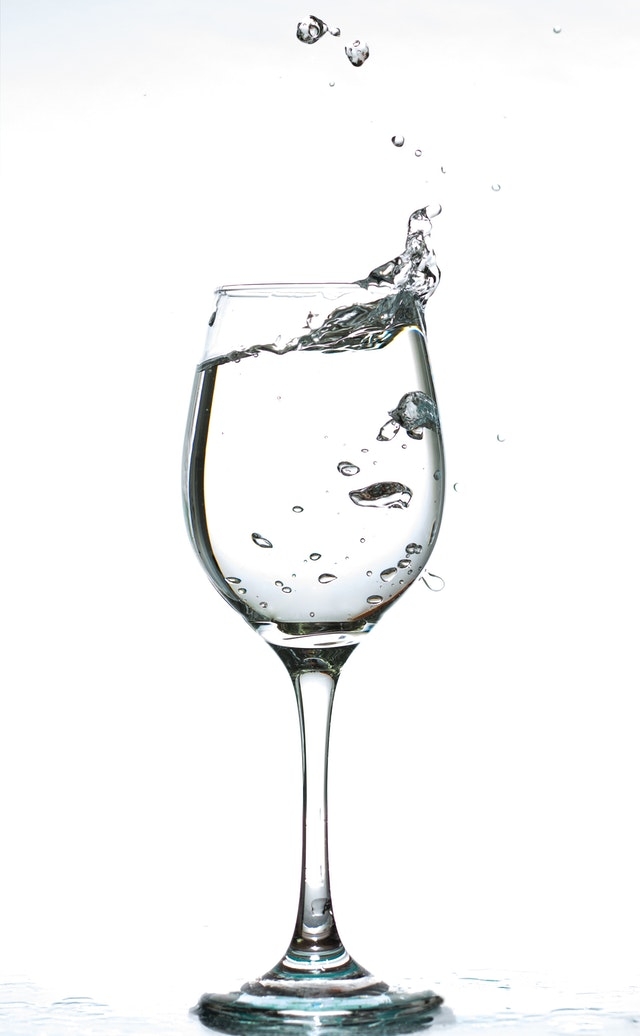 Clear water in wine glass